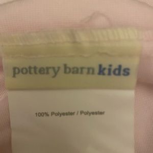 Pottery barn kids fitted soft channile light pink sheet.